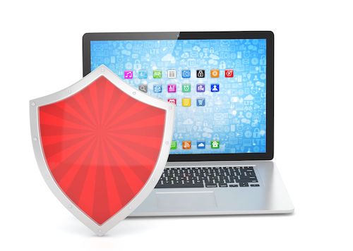 Firewall-Symbolbild - Schutzschild vor Laptop